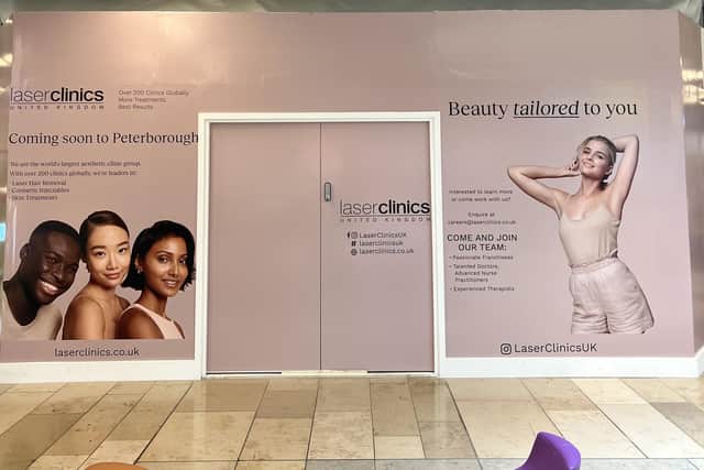 Advertising hoardings have gone up outside the unit in the Queensgate shopping centre that will be occupied by the Laserclinics.