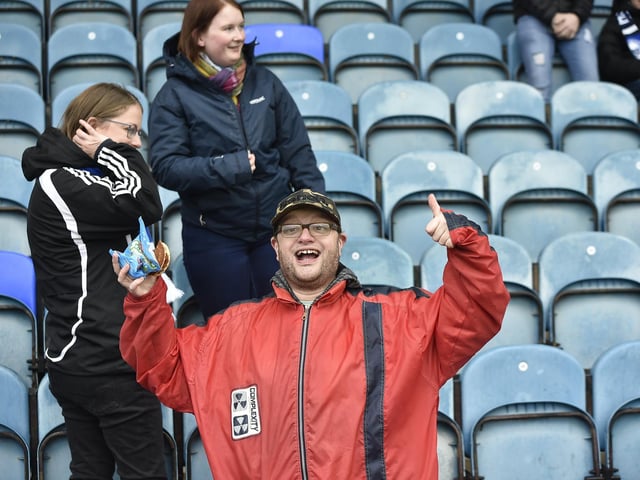 Peterborough United fans watch their side struggle to a 2-2 draw at home to Salford.