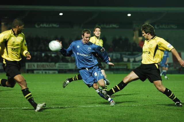 Peter Gain in action for Posh at Burton in a 2005 FA Cup tie. Photo: Alan Storer.