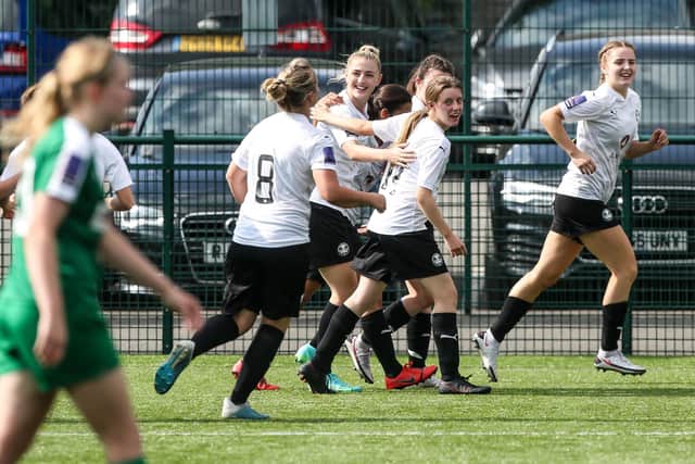 Posh Women celebrate a National League last season.