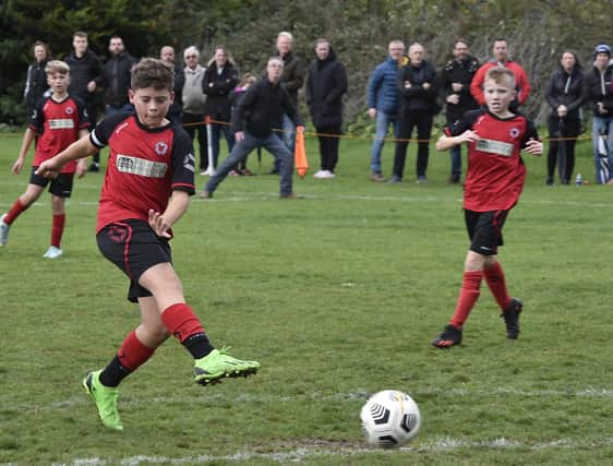 Netherton United (red) and Feeder Under 12s drew a big crowd to the Grange last weekend. Photo: David Lowndes.