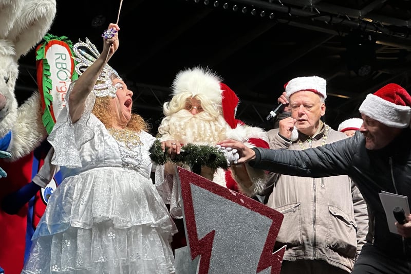 Father Christmas and Peterborough Mayor Councillor Nick Sandford help star of stage and screen, Cheryl Fergison, with the big switch-on.