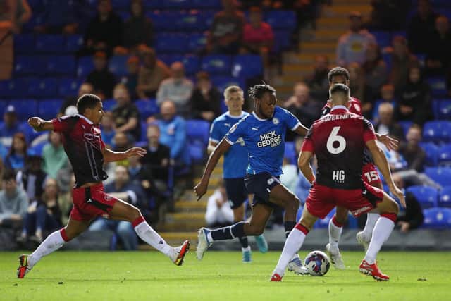 Ricky-Jade Jones of Peterborough United takes on Stevenage defence. Photo: Joe Dent.