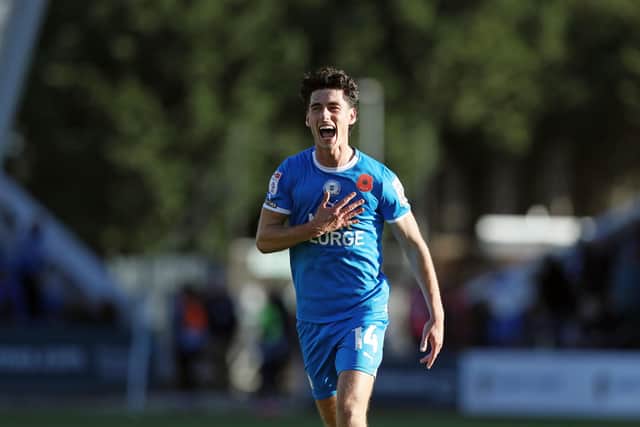 Posh star Joel Randall celebrates a goal in the 5-0 win over Cambridge United/ Photo: Joe Dent/theposh.com.