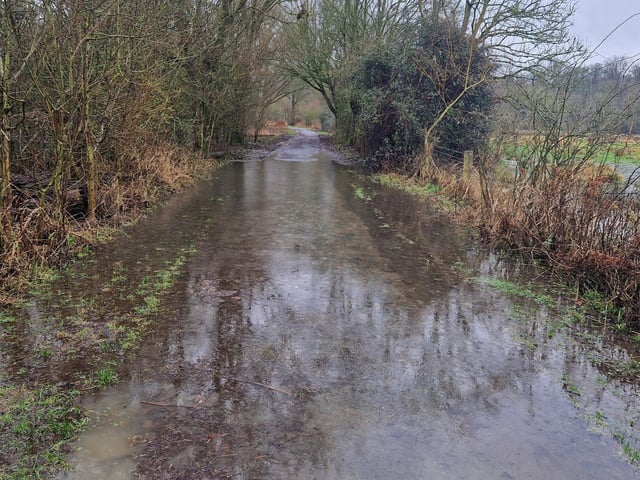 Flooded path leading to Milton Ferry Bridge.