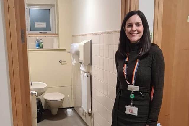 
Cancer Wellbeing Advanced Occupational Therapist Caroline Lansell outside one of the service’s toilets.
