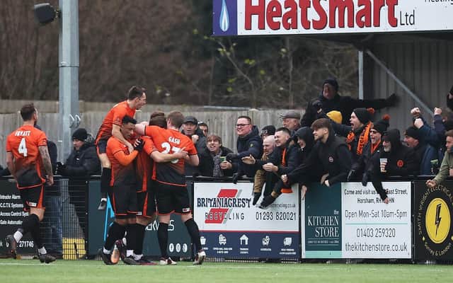 Peterborough Sports celebrate a goal at Horsham in front of their own fans. Photo: Natalie Mayhew