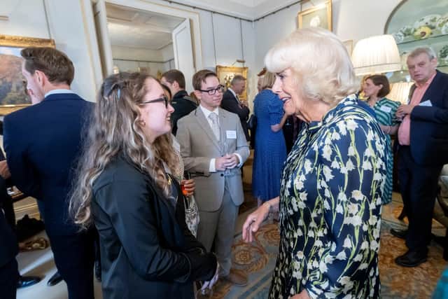 Queen Camilla, who is patron of the National Literacy Trust, congratulates Jack Hunt student Jessica-Hollie Price.