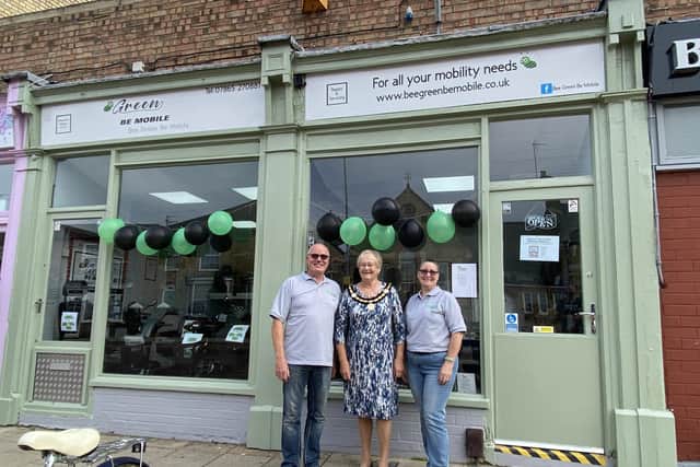 Sean and Heidi Ruggles with the Mayor of Whittlesey Councillor Kay Mayor, centre, outside the new Bee Green Be Mobile shop in Whittlesey