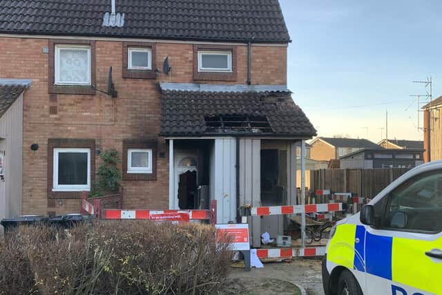 Man arrested on suspicion of arson after woman injured in blaze at ...