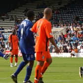 Neil Wood (left) scores for Posh against Colchester United in 2003.