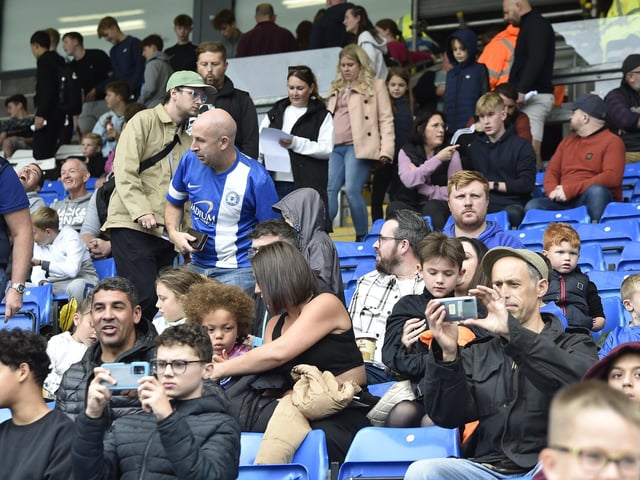 Peterborough United fans are pictured enjoying the win over Bristol Rovers.