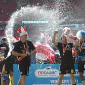Posh celebrate victory in the 2011 League One play-off final at Old Trafford. Photo David Lowndes.