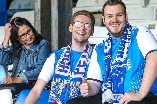 Posh fans watch the 3-0 defeat at Luton Town on the opening day of the 2021/22 season