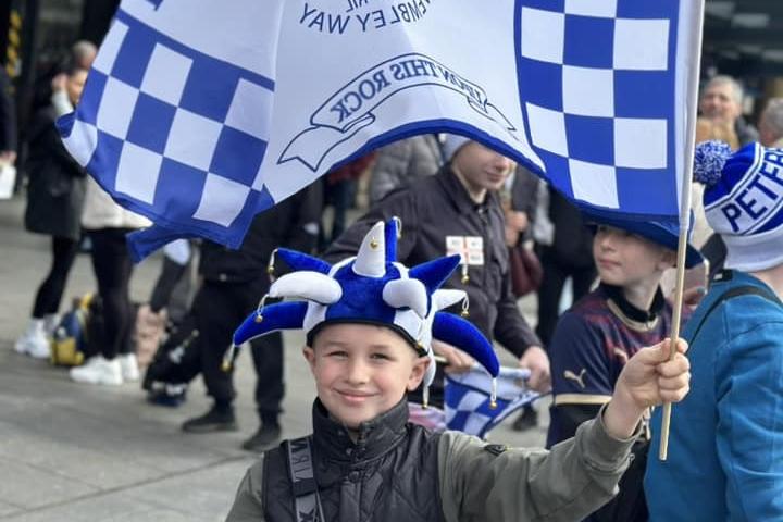 This picture of a young fan outside Wembley was sent in by Kayleigh Broll
