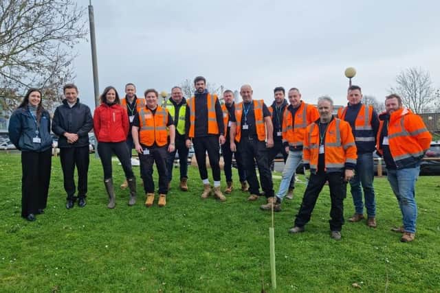 The Estates Team at Hinchingbrooke Hospital plating the new trees.