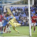 Joel Randall scores Posh's opening goal against Wycombe in October directly from a corner.
