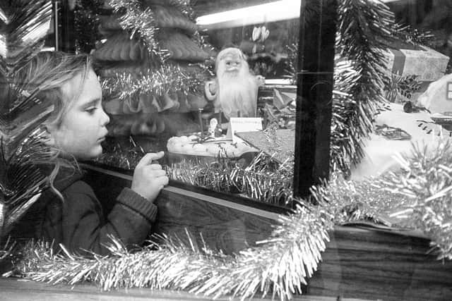 The original photo with three-year-old Tracey