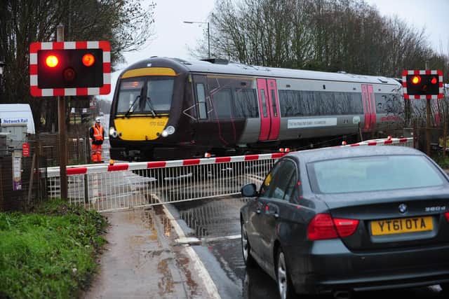 Kings Dyke level crossing has famously caused tailbacks on the A605, almost as far back as Stanground, when the barriers, pictured in this incident here back in 2012, failed to open (image: Peterborough Telegraph)
