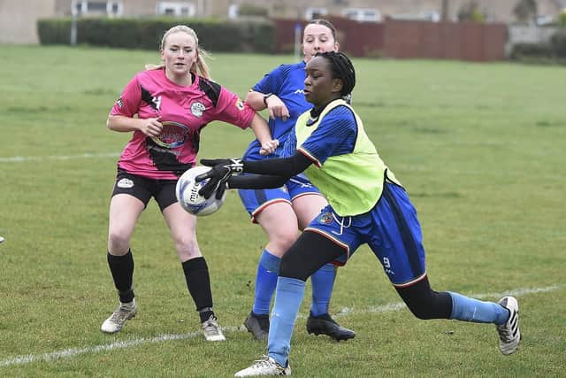 Action from ICA Sports (blue) and Girls United in the Cambs Girls Under 18 League. Photo: David Lowndes.