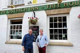 Landlord of the Ostrich Inn Graham Finding, left, with Peterborough MP Paul Bristow.