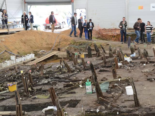 Often referred to as 'Britain's Pompeii', Must Farm an exceptionally well-preserved Late Bronze Age settlement between Peterborough and Whittlesey. In 1999 decaying timbers were discovered protruding from the southern face of the brick pit at Must Farm. Investigations in 2004 and 2006 dated the timbers to the Bronze Age and identified them as a succession of large structures spanning an ancient watercourse. The Must Farm settlement archive includes weapons, textiles, beads, fish traps, cooking items, and Britain’s earliest wheel.
