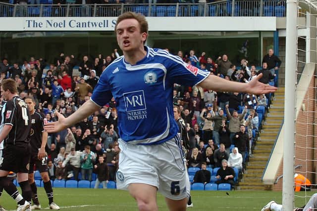 Charlie Lee celebrates a match-winning goal for Posh against Northampton. Photo: David Lowndes