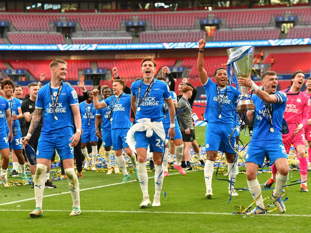 Harrison Burrows celebrating at Wembley with the EFL Trophy.