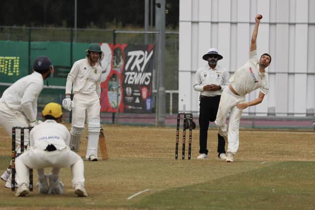 Josh Smith bowling for Peterborough Town against Stony Stratford. Photo Andy Dann