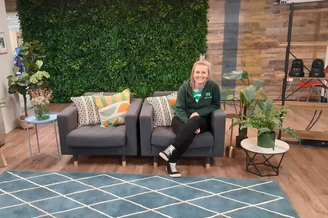 Woodgreen pet advisor Lizzie Charnock is a fan favourite among viewers of the show. Here we see her sitting in the reception lounge area (a crew-built set) where people looking to adopt a dog initially meet with Woodgreen staff to chat about the type of pet they'd like to take home