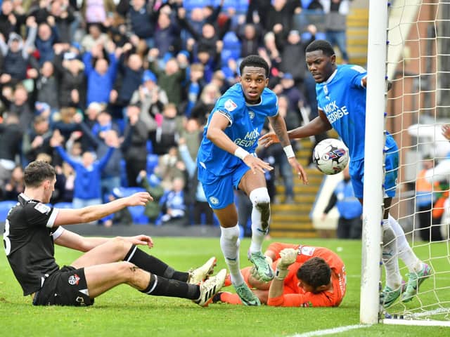 Malik Mothersille has just scored his second goal for Posh against Bolton. Photo David Lowndes.