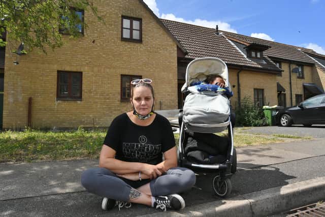 St Michael's Gate tenant Nadine Jones and child Keanne Jones (2) facing eviction from her home.