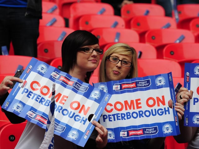 Peterborough United fans soak in the Wembley atmosphere in 2014.