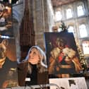 Anna Auty with her dog pics on canvas at Peterborough Cathedral Christmas market.