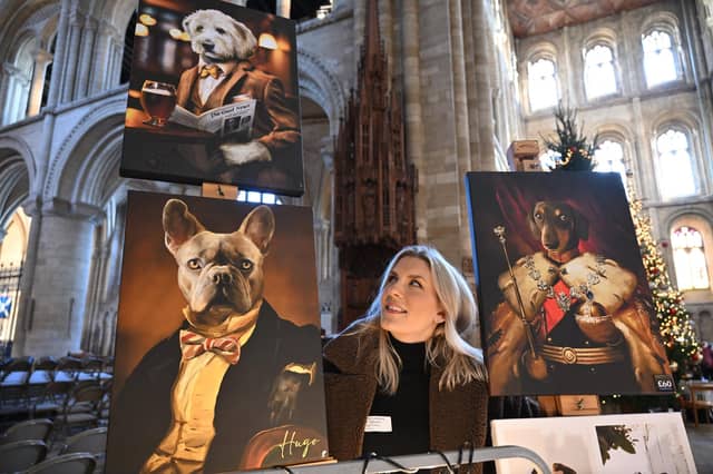 Anna Auty with her dog pics on canvas at Peterborough Cathedral Christmas market.