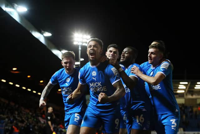 Jonson Clarke-Harris of Peterborough United celebrates his second goal against Barnsley. Photo: Joe Dent/theposh.com.