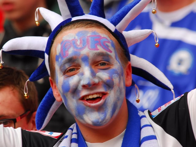 Peterborough United fans soak in the Wembley atmosphere in 2014.