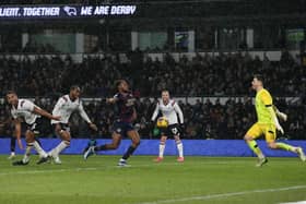 Ricky-Jade Jones of Peterborough United scores the winning goal against Derby County. Photo Joe Dent/theposh.com