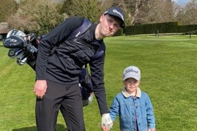 Euan with his cousin Reggie at the memorial golf day