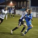 Connor Kennedy (blue) in action for Peterborough Sports against Scarborough Athletic. Photo: David Lowndes.