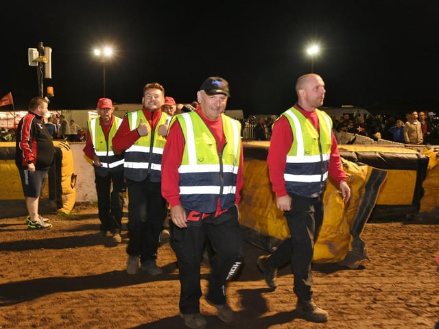 The track officials.