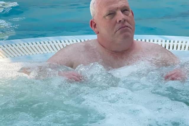 Jimmy enjoys a dip in the pool.