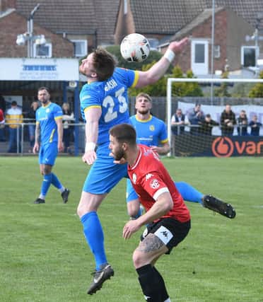 MIchael Gash (blue) in action for Peterborough Sports against Hereford. Photo: David Lowndes.