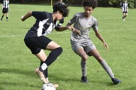 Action from Peterborough Lions Under 15s (stripes) v Northside. Photo: David Lowndes.