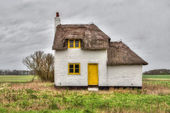 According to Historic England, the cottage's distinctive yellow door and windows were painted in the early 20th century by the Dixon-Spain family who owned a number of different farms in the area. It is believed they used a colour coding scheme to identify their buildings and machinery.