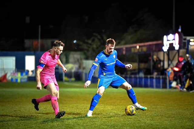 Josh Moreman (blue) has two goals in two games for March Town. Photo: James Richardson.