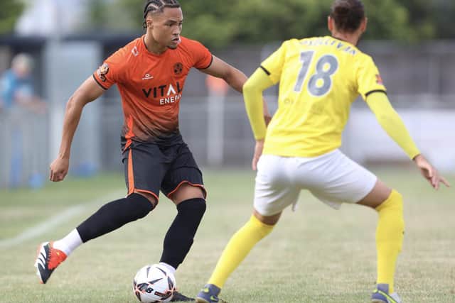 MJ Kamson-Kamara (orange) has broken his foot. Photo Darren Wiles.