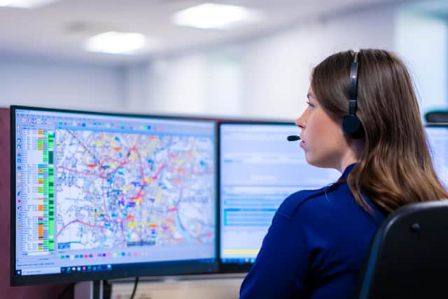 A Cambs Police call handler in action.