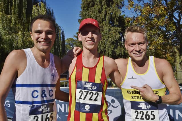 Great Eastern Run 2022 winner Logan Smith flanked by third-placed Pete Robinson (right) and second-placed Chris Darling (left). Photo: David Lowndes.