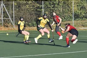 Hockey action from City of Peterborough Ladies 1sts  (red) v Norwich City. Photo: David Lowndes.